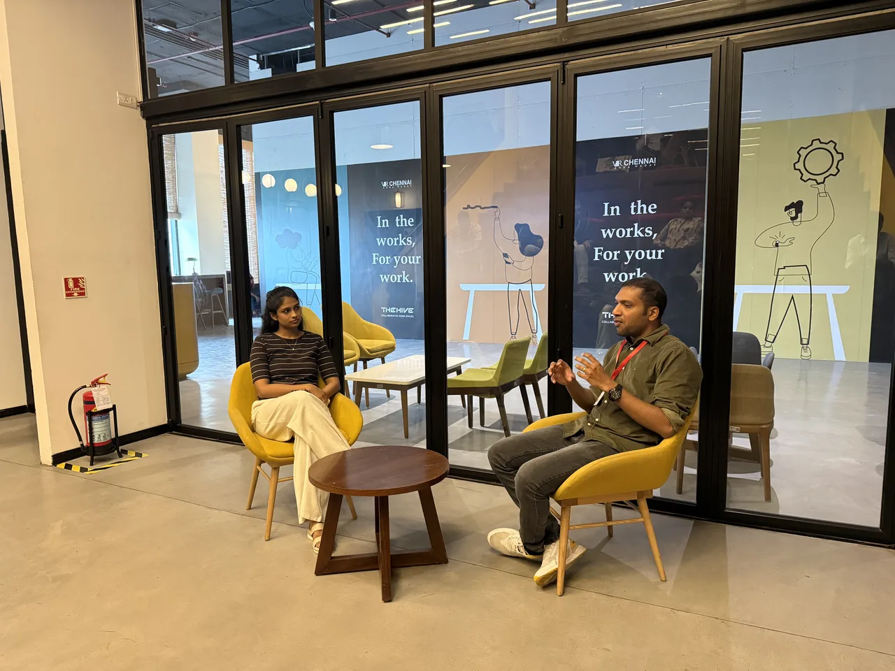 The fireside keynote at Circa Vol. 02: two speakers seated in conversation at The Hive, Chennai.