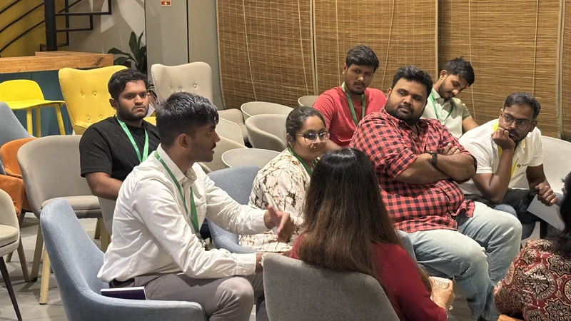 A candid group deep in discussion at Circa Vol. 03, Chennai.