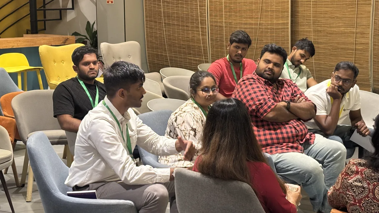 A candid group deep in conversation at Circa Vol. 03, The Hive, OMR, Chennai.